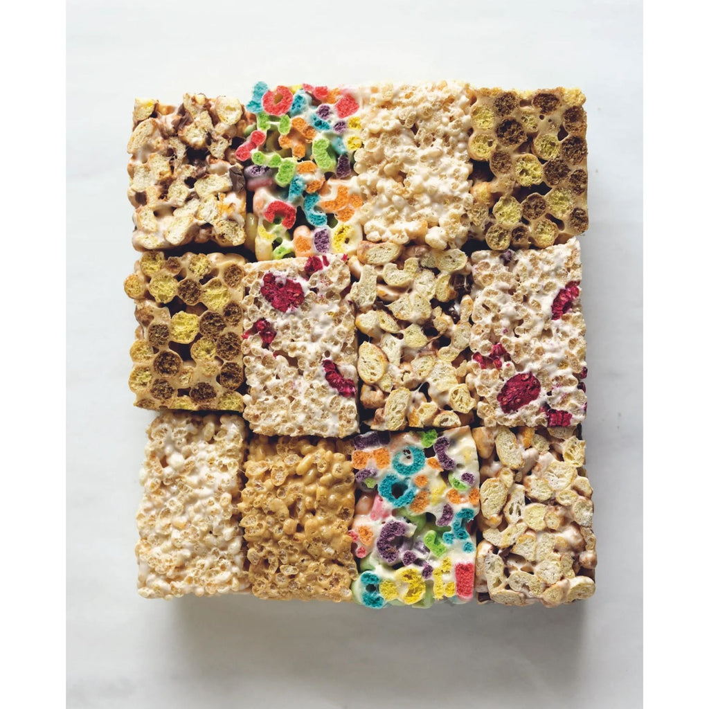 Displayed on a white background is a grid of nine crunchy cereal bars, each showcasing a distinct cereal mix reflecting Zoë François' artistic touch. Some bars are adorned with vibrant cereal bits reminiscent of the enchanting recipes in "Zoë Bakes Cookies: Everything You Need to Know to Make Your Favorite Cookies and Bars" by Gneiss Spice, while others feature chocolate pieces and classic puffed rice.