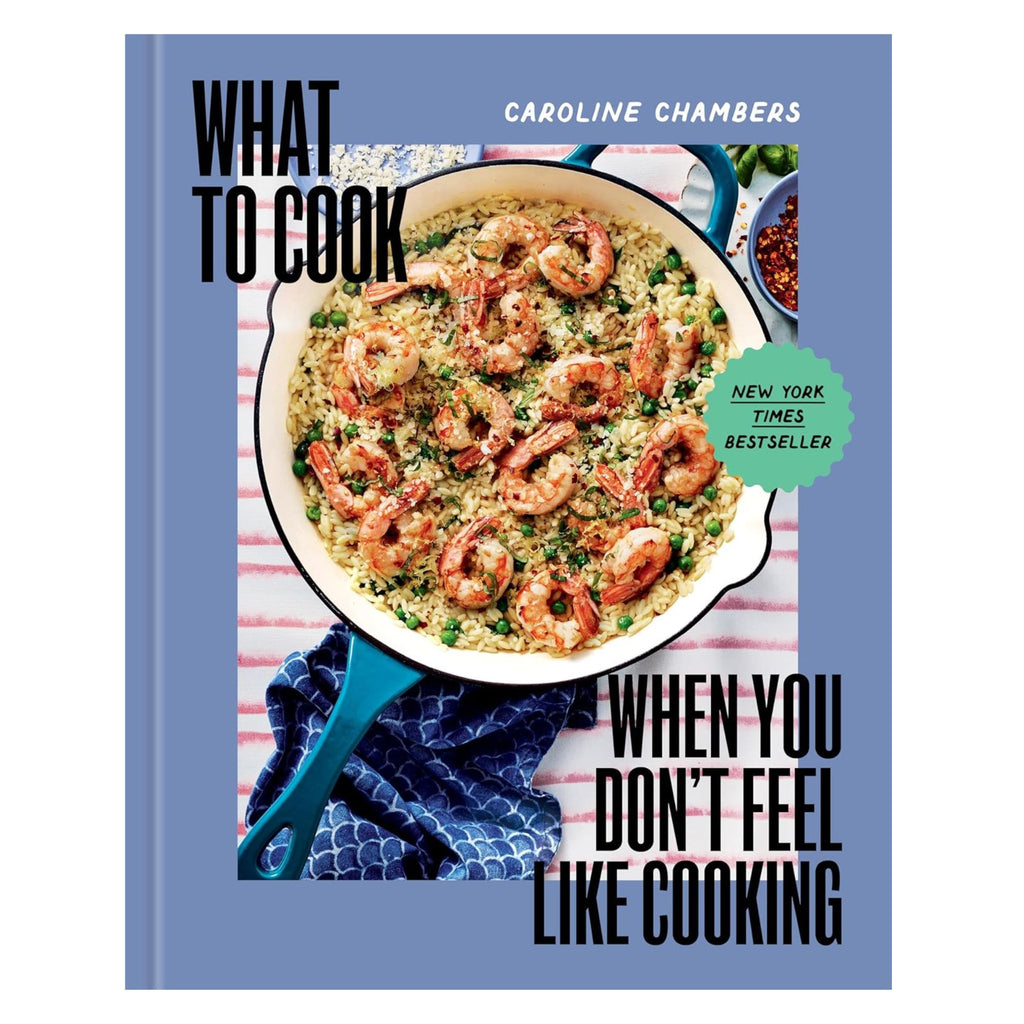 Cover of the cookbook titled "What To Cook When You Don't Feel Like Cooking" by Caroline Chambers, published by Gneiss Spice. It features quick meal ideas with a dish of shrimp and rice in a pan and is labeled as a "New York Times Bestseller," making it ideal for those looking for simple recipes.