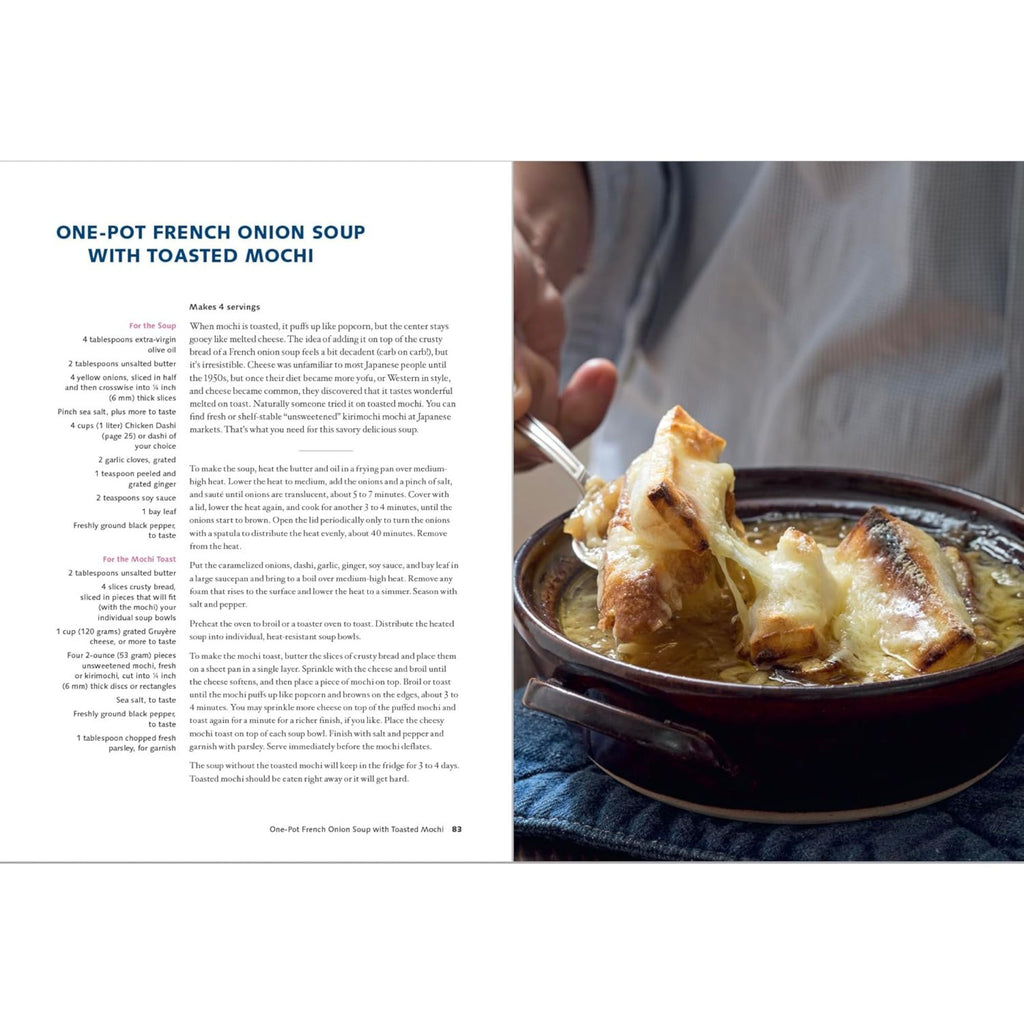 A page from "Wafu Cooking: Everyday Recipes with Japanese Style" by Gneiss Spice showcases a recipe for one-pot French onion soup with toasted mochi, infusing Japanese-inspired fusion cuisine. The adjacent page features a close-up of chopsticks lifting melted cheese and mochi from the bowl, while text and ingredients invite adventurous home cooks to explore on the left page.