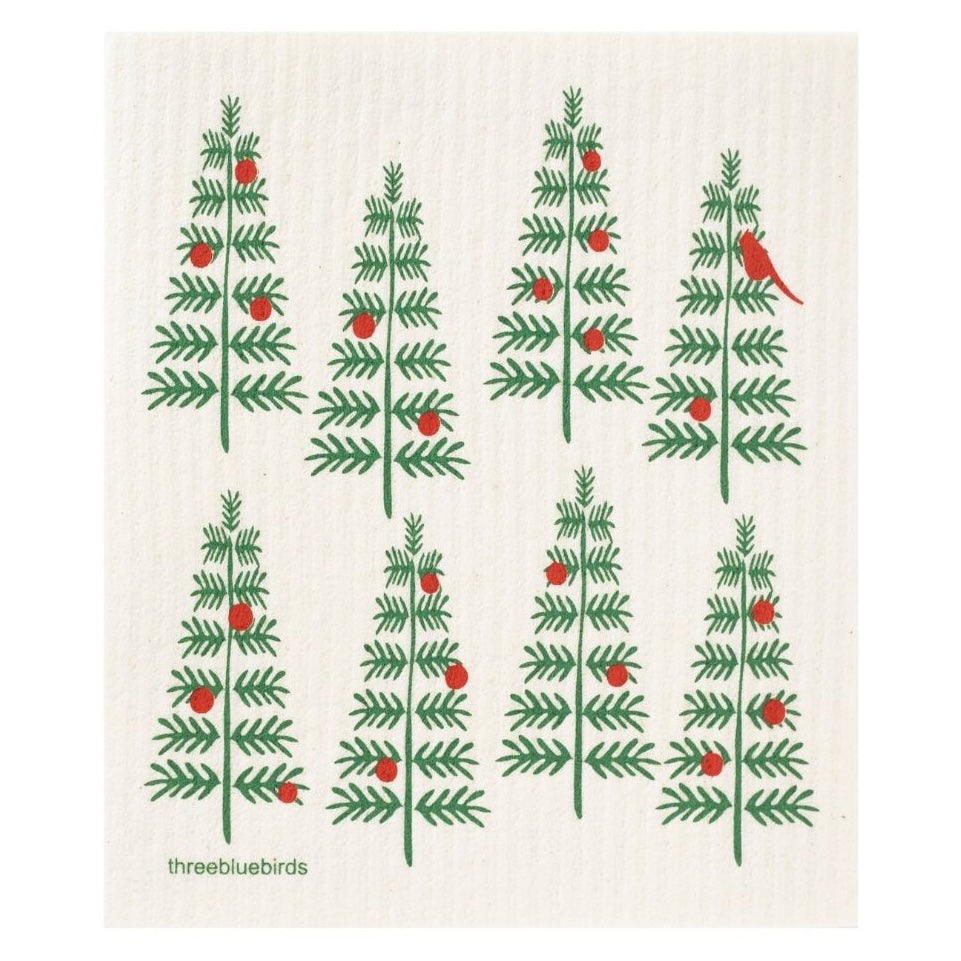 The image features the Gneiss Spice Swedish Dishcloth — Christmas Tree, displaying a pattern of six stylized green trees embellished with red ornaments, with one tree featuring a red bird perched on it. The light cream background enhances the dishcloth's charm, embodying both eco-friendly and sustainable qualities for style and utility.