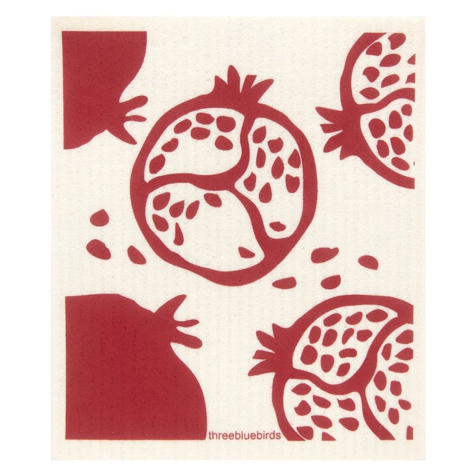 Illustration featuring red pomegranate segments, seeds, and whole fruit against an off-white backdrop. The design is stylized and repetitive, echoing patterns typical of eco-friendly Swedish dishcloths by Gneiss Spice. The text "threebluebirds" is displayed at the bottom.