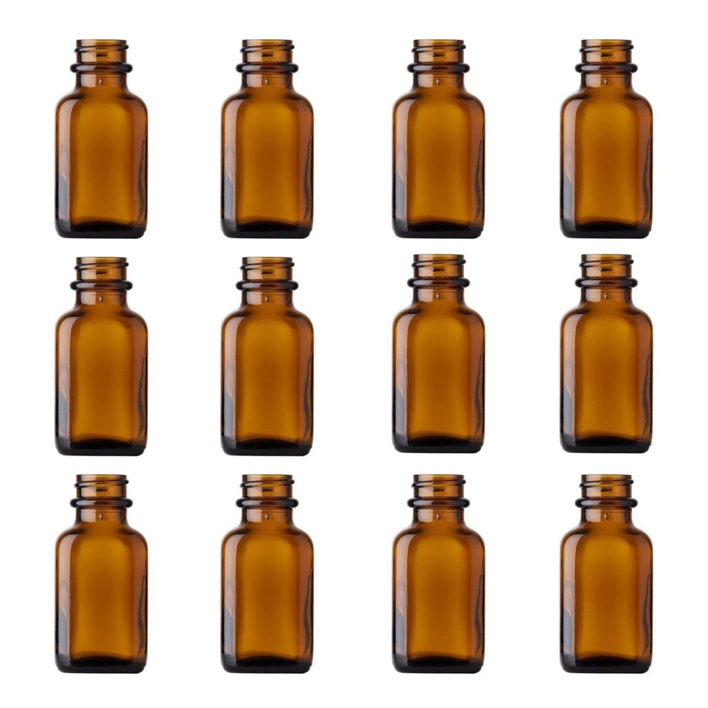 Twelve identical Amber Blake Glass Bottles with metal lids by Gneiss Spice are arranged in a 3-by-4 grid on a white background. These small, empty amber bottles are perfect for homemade vanilla extract.