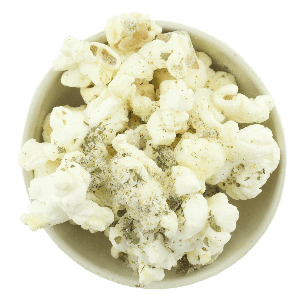 Gneiss Spice offers Popcorn Spice — Ranch, featuring white popcorn seasoned with green herbs and ranch flavors, all in eco-friendly zero-waste packaging.