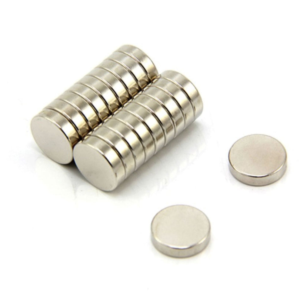 Two stacks of the Replacement Component: Additional Magnet for Sliding Jar by Gneiss Spice are arranged neatly on a white surface, with two extra magnets placed separately to the side.