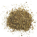 Gneiss Spice Basil is a dried, crushed green herb blend with small leaves and stems, shown against a white background—perfect for Italian dishes or as an eco-friendly, zero-waste spice refill.