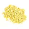 Loose pile of pale yellow mustard powder